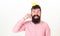 Party king, birthday concept. Happy bearded man on white background. Man with long beard and open mouth holding paper