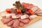 Party plate of salami, meat delicatessen
