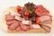 Party plate of salami, meat delicatessen