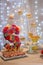 Party table, candies, homemade dessert, lovely details. Front view. Bokeh lights background