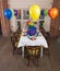 Party table with latex baloons in different colours