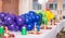 Party table with latex baloons in different colours