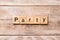 PARTY word written on wood block. PARTY text on wooden table for your desing, concept