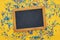 party yellow background with colorful confetti and blackboard