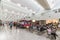 Pasay, Metro Manila, Philippines - Food kiosks and passengers inside the departure area of NAIA Terminal 3