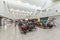 Pasay, Metro Manila, Philippines - Food kiosks and passengers inside the departure area of NAIA Terminal 3