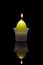 Paschal candle in a glass candlestick