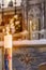 Paschal candle illuminates the altar and tabernacle of the heart of Jesus