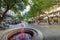 Paseo Sarmiento pedestrian street fountain with red water like wine - Mendoza, Argentina