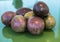 Pasiflora fruits on glass table