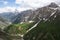 Pass with the glacier and green grass. Fann Mountains. Tajikistan