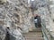 Passage, doorway, archway in an old ancient medieval fortress made of cobblestones and bricks in a tourist warm tropical eastern