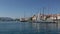 Passage of sailing vessel along the coast of Poros island, Aegean Sea, Greece