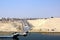 Passage through the Suez Canal by large sea vessels.