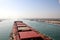 Passage through the Suez Canal by large sea vessels.