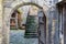 Passage to courtyard in medieval city Honfleur in Normandy, France