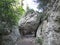 Passage under a big rock in the Regalon gorges in the Luberon in Provence