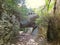 Passage under a large rock in the Regalon gorges in the Luberon in Provence