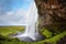 Passage under waterfall Seljalandsfoss