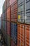 Passageway between container rows stacked on deck of the container ship