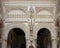 Passageway inside the Mosque-Cathedral of Cordoba in Spain with sculptures and reliefs.