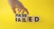 Passed and Failed symbol. Businessman hand turnes wooden cubes and changes word Failed to Passed. Beautiful yellow background.