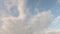 A passenger airliner flies in the sky. Sky time lapse, airplane fly by. Beautiful Universally Cloudscape background.