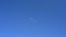 Passenger airplane against blue sky.