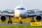 Passenger airplane airliner performs a u-turn on the runway, front view