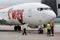 Passenger airplane Boeing 737 of T `way Air prepares for departure. Engineers check aircraft systems. Service and maintenance