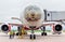 Passenger airplane Boeing 777-300 of Rossiya Airlines prepares for departure. Fuselage is painted as face of Far Eastern leopard.