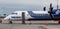Passenger airplane Bombardier Q400 NextGen of Aurora company on service on airfield