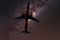 Passenger airplane in the clouds and stars. air transport concept