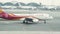 Passenger airplane driving on runway for taking off in airport terminal Hong Kong city, China. Aircraft moving on runway