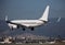 Passenger airplane landing in El Prat Airport