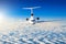 Passenger airplane with three engines on the tail flying at flight level high in the sky above the clouds and blue sky. View direc