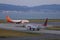 Passenger airplanes taxiing on runway