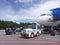 Passenger baggage waiting in line to board the plane