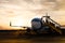 Passenger boarding on airplane in vacation in silhouette