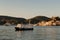 The passenger boat on the background of the island of Poros Gre