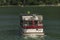 Passenger boat on Ossiacher see near Villach town in summer hot day