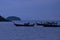 Passenger boats in peace blue sea and night sky