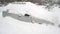 Passenger car after heavy snowfall.