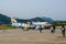 Passenger carry all luggage to plane at Luang Prabang International Airport.