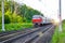 Passenger commuter train in motion. Russia