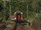 Passenger diesel red big train near Kysak station in summer hot morning