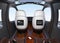 Passenger Drone interior. Monitor mounted on seats backrest. Headsets on each seats and smartphone on small table