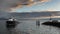 Passenger ferry on lake Geneva at sunset.