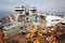 PASSENGER FERRY, MIDSEA, SPAIN - JUNE 09, 2012: Passengers enjoy at swimming pool on upper deck of The luxury cruise MSC SPLENDIDA