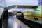 Passenger modern subway train running fast on station motion blur